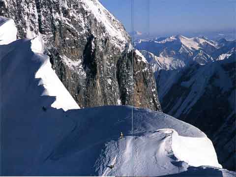 
J.C. Lafaille and Alberto Inurrategi climbing Annapurna East Ridge towards Roc Noir while a Basque climber decided to stop because the route is too difficult - Himalayan Quest: Ed Viesturs on the 8,000-Meter Giants book
